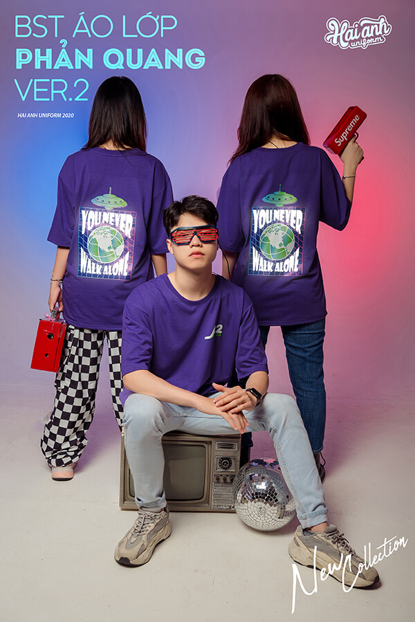 Mẫu áo lớp phản quang in decal màu tím violet với slogan “YOU NEVER WALK ALONE”