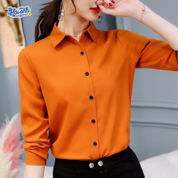 Mẫu áo sơ mi đồng phục màu cam phối cúc đen