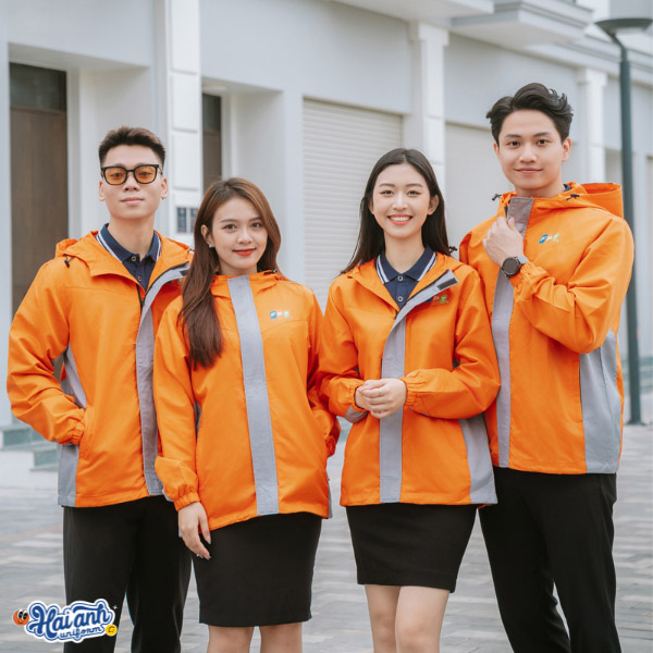 Mẫu đồng phục áo khoác với thiết kế màu cam và xanh mang xu hướng hiện đại, trẻ trung và năng động cho doanh nghiệp