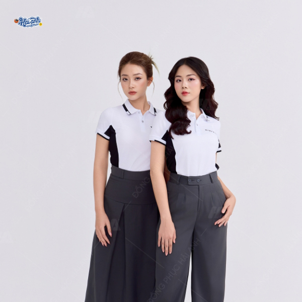 Áo đồng phục kết hợp màu trắng và đen tạo nên vẻ sang trọng