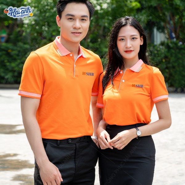 Mẫu polo SHB do Hải Anh Uniform màu cam phối hồng độc đáo