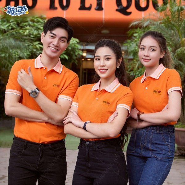 Mẫu áo polo đồng phục nhà hàng màu cam phối cổ dệt