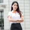 Mẫu áo đồng phục FPT màu trắng gạo phối cam