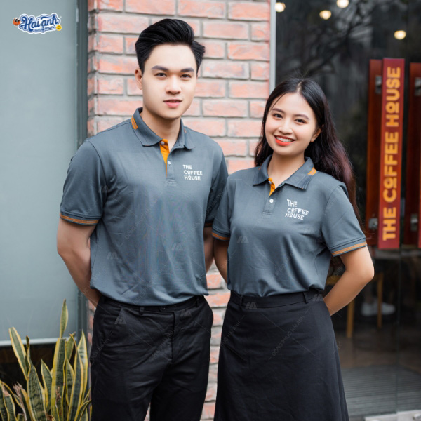 Mẫu áo polo  đồng phục ấn tượng với chi tiết phối cam xen kẽ nổi bật
